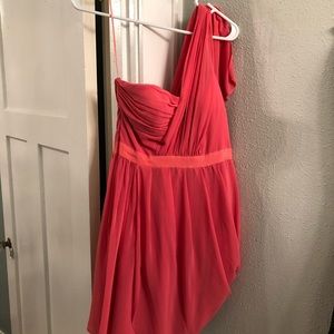Salmon colored cocktail dress.